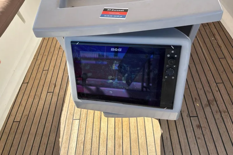  Yacht Photos Pics B&G navigation system on 2019 Beneteau Oceanis 45 yacht, wooden deck background.