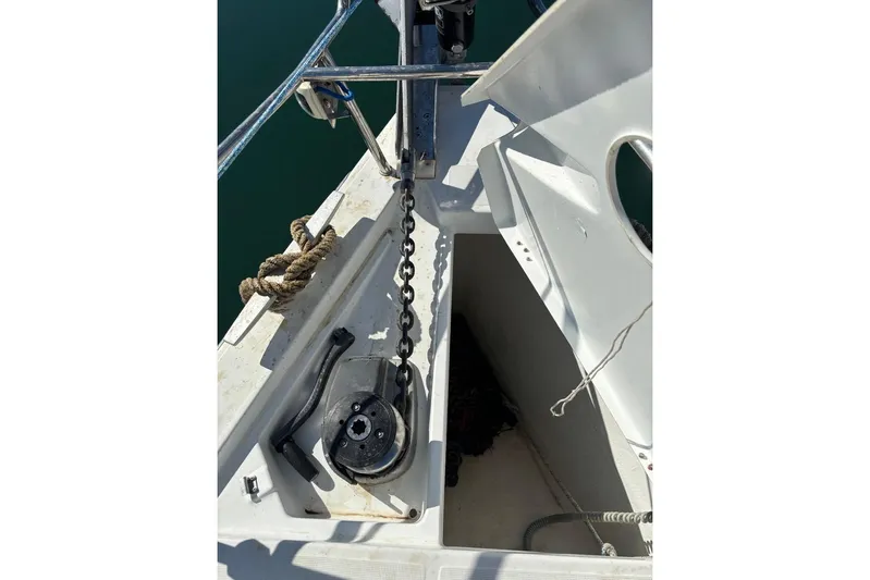  Yacht Photos Pics Anchor chain and windlass on 2019 Beneteau Oceanis 45 sailboat deck.