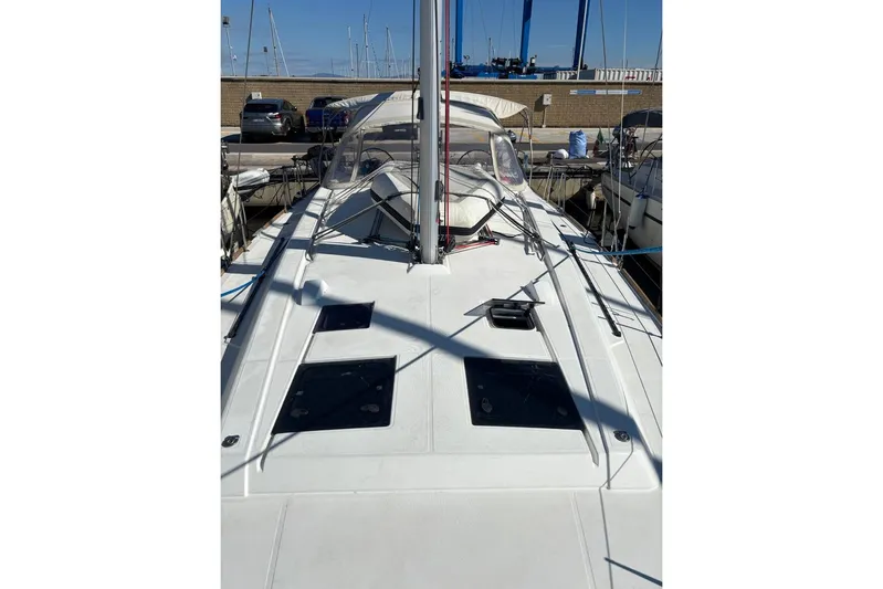  Yacht Photos Pics 2019 Beneteau Oceanis 45 sailboat deck view at marina.