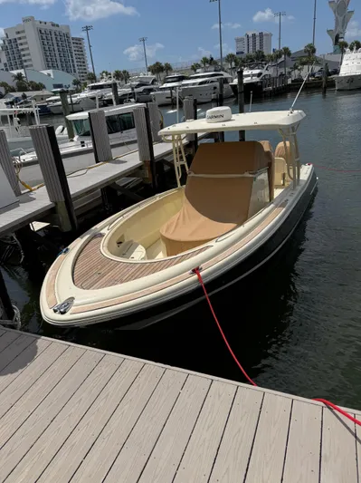  Yacht Photos Pics 2018 Chris-Craft Catalina 30 docked at marina under clear sky.