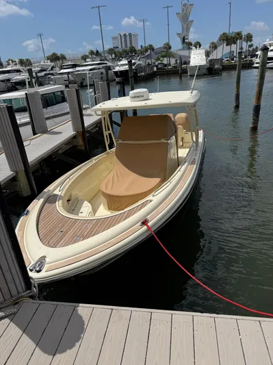  Yacht Photos Pics 2018 Chris-Craft Catalina 30 docked at marina, featuring elegant design and beige cover.