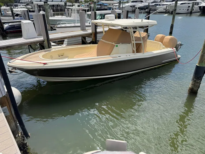  Yacht Photos Pics 2018 Chris-Craft Catalina 30 boat docked in marina, featuring sleek design and twin engines.