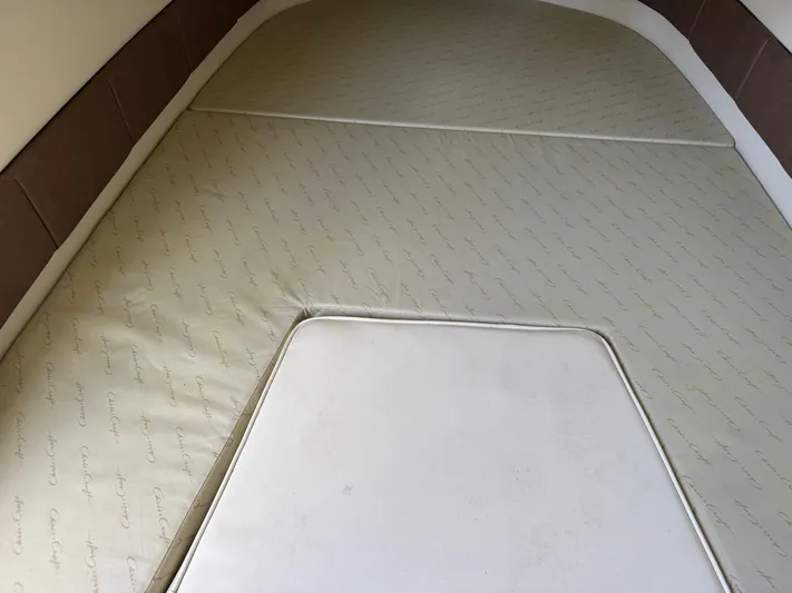  Yacht Photos Pics 2018 Chris-Craft Catalina 30 cabin interior with custom beige upholstery.