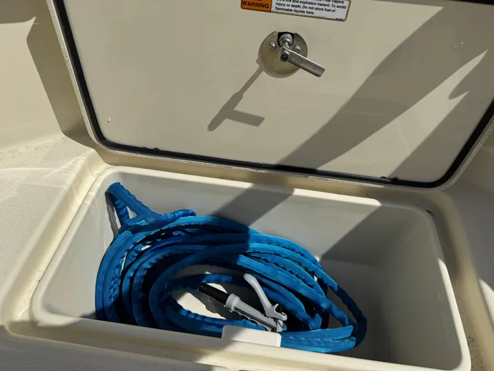  Yacht Photos Pics Storage compartment with blue rope on a 2018 Chris-Craft Catalina 30 boat.