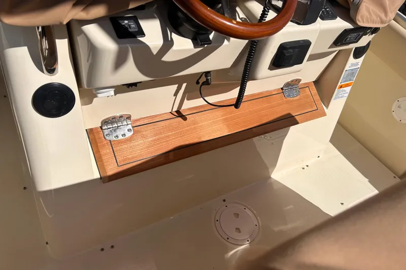 Yacht Photos Pics 2018 Chris-Craft Catalina 30 helm with wooden accents and steering wheel.