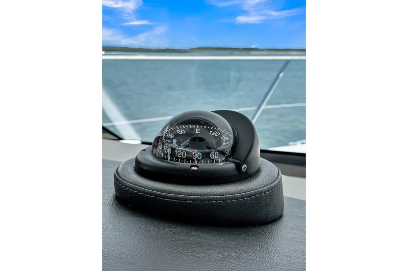  Yacht Photos Pics Compass on 2020 Riviera 4800 Sport Yacht dashboard with ocean view.