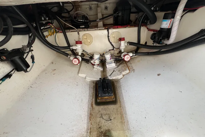  Yacht Photos Pics 2008 Triton 351 CC boat interior showing wiring and mechanical components.