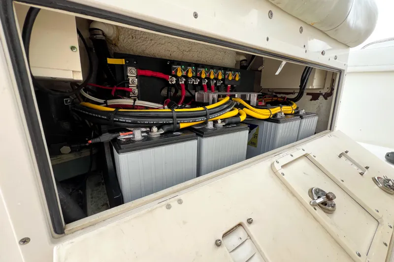  Yacht Photos Pics Battery compartment of a 2008 Triton 351 CC boat with wiring and connections.