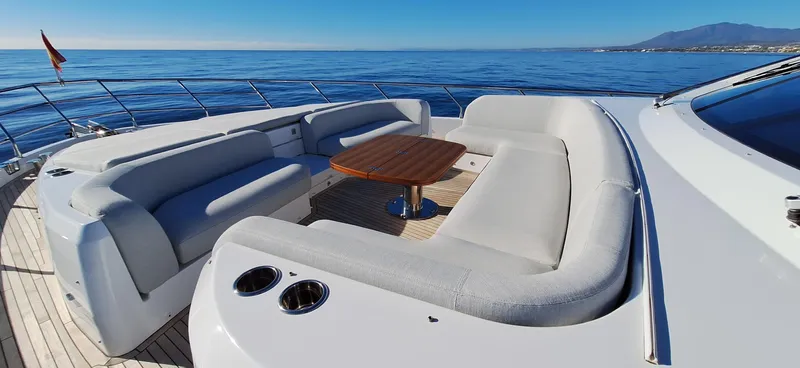 Nassara Yacht Photos Pics Luxurious 2023 Azimut 78 yacht deck with elegant seating and ocean view.