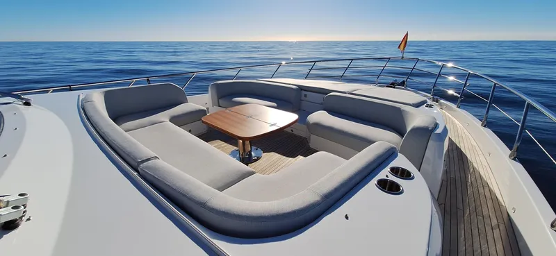 Nassara Yacht Photos Pics Luxurious 2023 Azimut 78 yacht with spacious deck seating and ocean view.