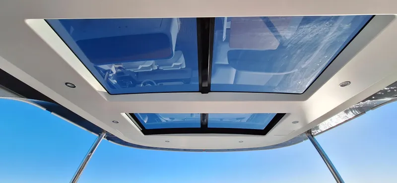 Nassara Yacht Photos Pics Rooftop view of 2023 Azimut 78 yacht with panoramic glass panels.