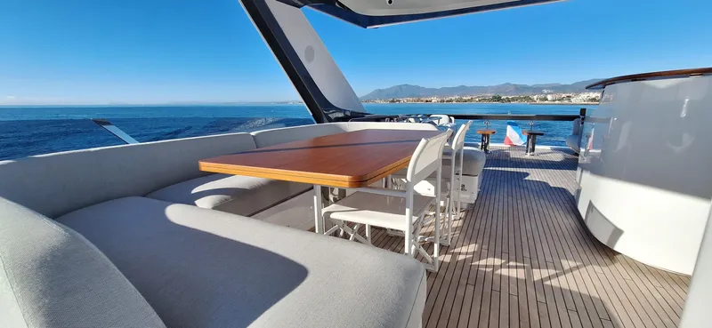 Nassara Yacht Photos Pics Luxurious 2023 Azimut 78 yacht deck with elegant seating and ocean view.