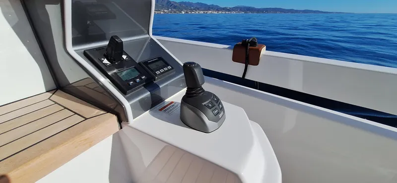 Nassara Yacht Photos Pics Control panel of 2023 Azimut 78 yacht with ocean view.