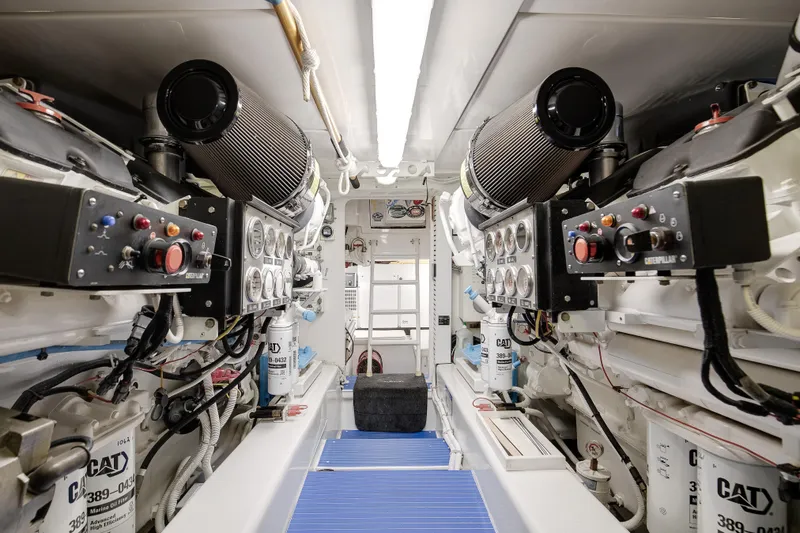 Dock Side Yacht Photos Pics Engine room of a 2007 Bertram 570 Convertible yacht with Caterpillar machinery.