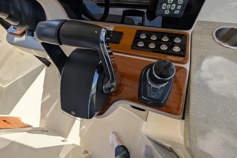  Yacht Photos Pics 2024 Boston Whaler 350 Realm helm controls with modern dashboard and joystick.
