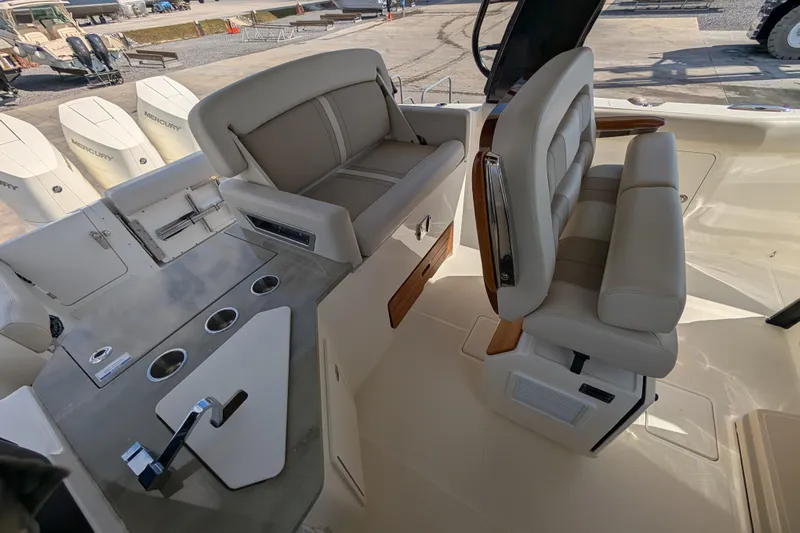  Yacht Photos Pics 2024 Boston Whaler 350 Realm interior with luxurious seating and modern design.
