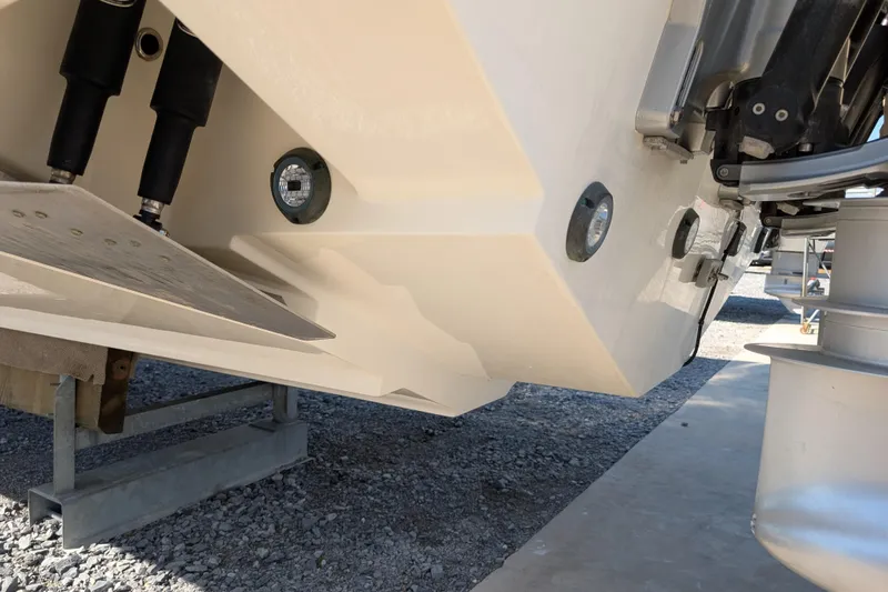  Yacht Photos Pics 2024 Boston Whaler 350 Realm boat hull and trim tabs detail.