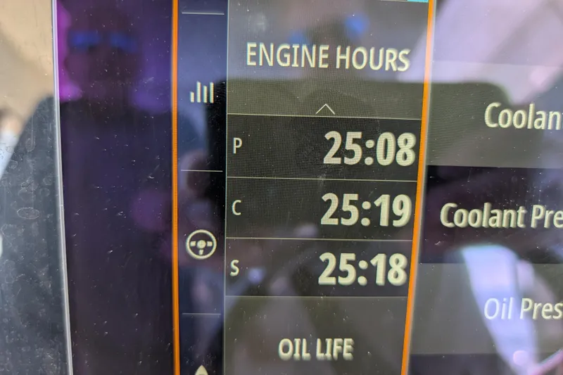  Yacht Photos Pics Display screen showing engine hours for 2024 Boston Whaler 350 Realm boat.