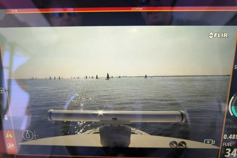  Yacht Photos Pics 2024 Boston Whaler 350 Realm navigation display showing a calm sea with distant sailboats.