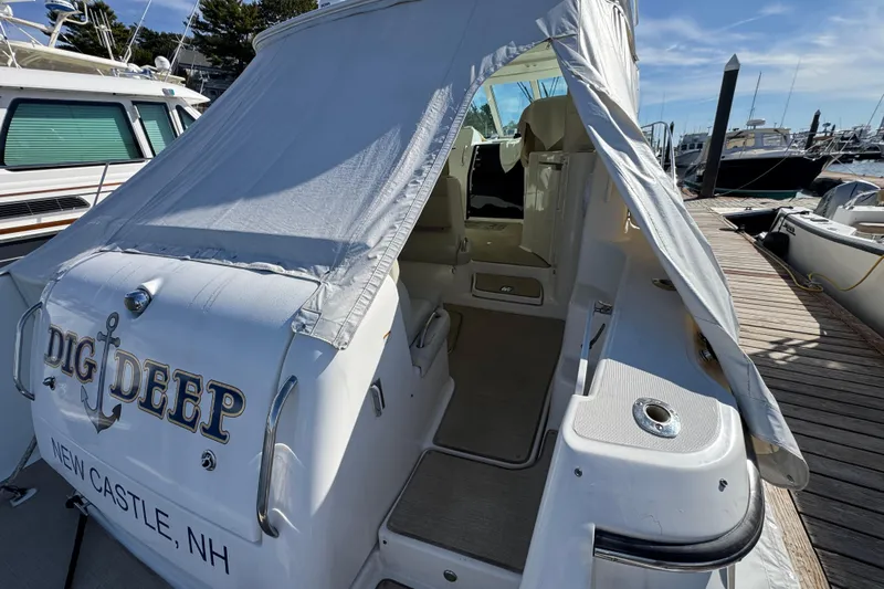  Yacht Photos Pics 2008 Tiara Yachts 3900 Sovran docked, featuring covered entrance and "Dig Deep" name.