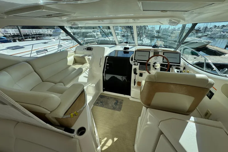  Yacht Photos Pics 2008 Tiara Yachts 3900 Sovran interior with leather seating and modern navigation equipment.