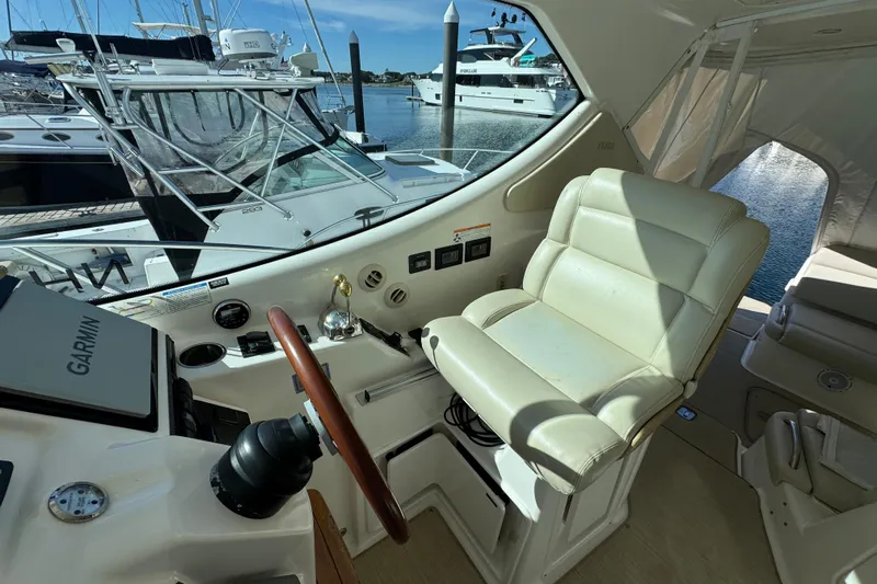  Yacht Photos Pics 2008 Tiara Yachts 3900 Sovran helm with leather captain's chair and Garmin navigation system.