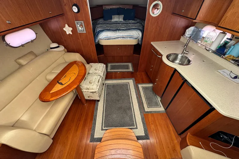  Yacht Photos Pics Luxurious interior of 2008 Tiara Yachts 3900 Sovran with cozy seating and modern amenities.