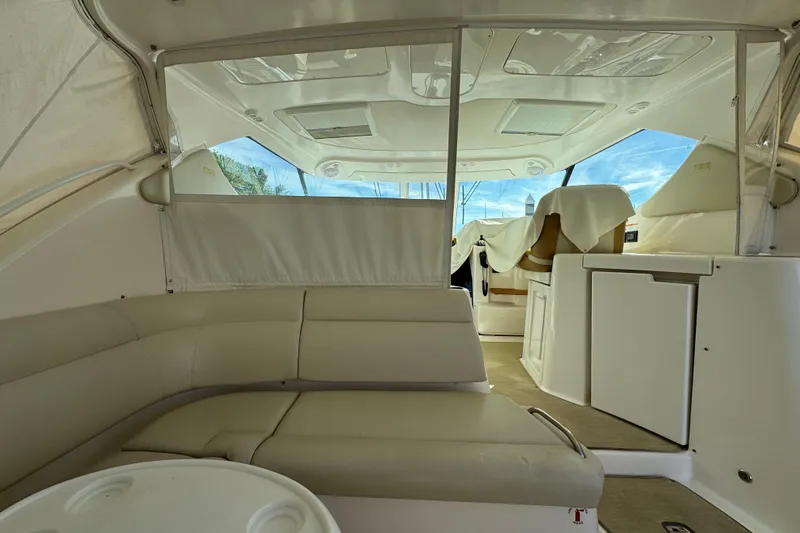  Yacht Photos Pics 2008 Tiara Yachts 3900 Sovran interior with beige seating and modern amenities.