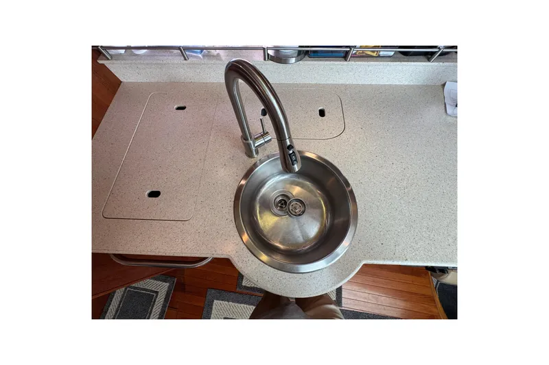  Yacht Photos Pics 2008 Tiara Yachts 3900 Sovran kitchen sink with modern faucet and countertop.