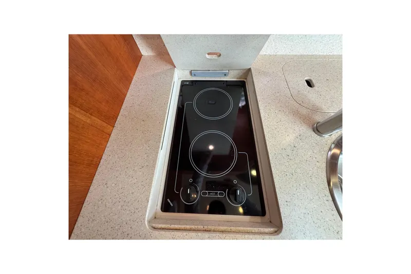  Yacht Photos Pics 2008 Tiara Yachts 3900 Sovran kitchen with sleek electric cooktop.