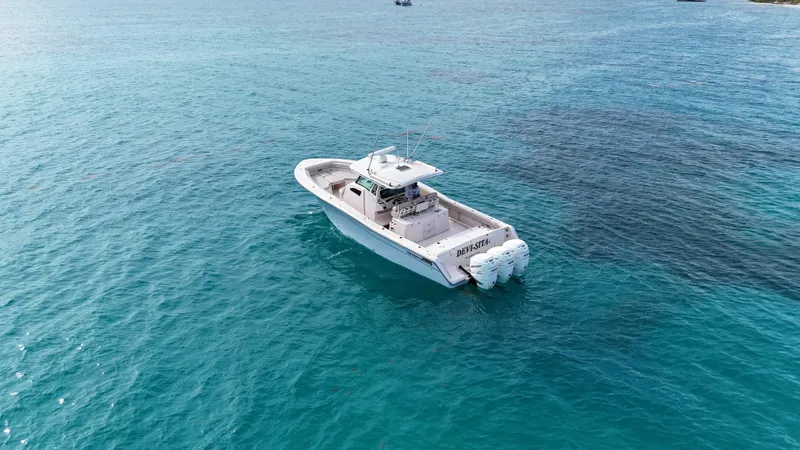  Yacht Photos Pics 2013 Grady-White Canyon 366 boat on clear blue ocean waters.