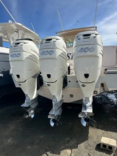  Yacht Photos Pics 2013 Grady-White Canyon 366 with triple 400 HP outboard engines.
