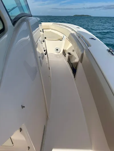  Yacht Photos Pics 2013 Grady-White Canyon 366 boat deck on open water.