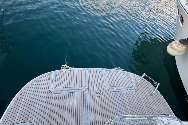 Annie Yacht Photos Pics Sleek deck of 2023 Nimbus 405 Coup&eacute; yacht on calm water.