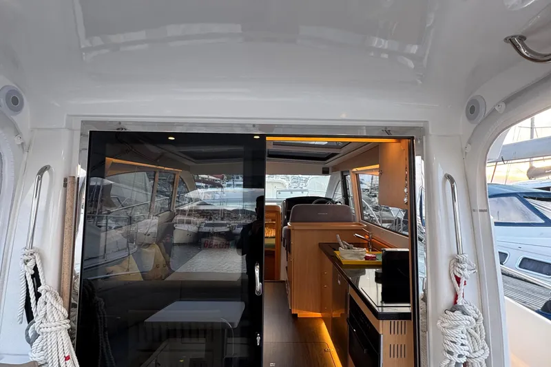 Annie Yacht Photos Pics Interior view of 2023 Nimbus 405 Coup&eacute; yacht, featuring modern design and amenities.