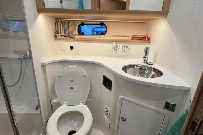 Annie Yacht Photos Pics Modern bathroom in 2023 Nimbus 405 Coup&eacute; yacht with sleek fixtures and compact design.
