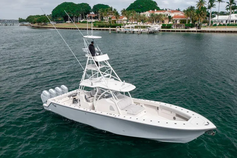  Yacht Photos Pics 2023 SeaVee 420Z boat on water, featuring multiple outboard engines and a sleek design.