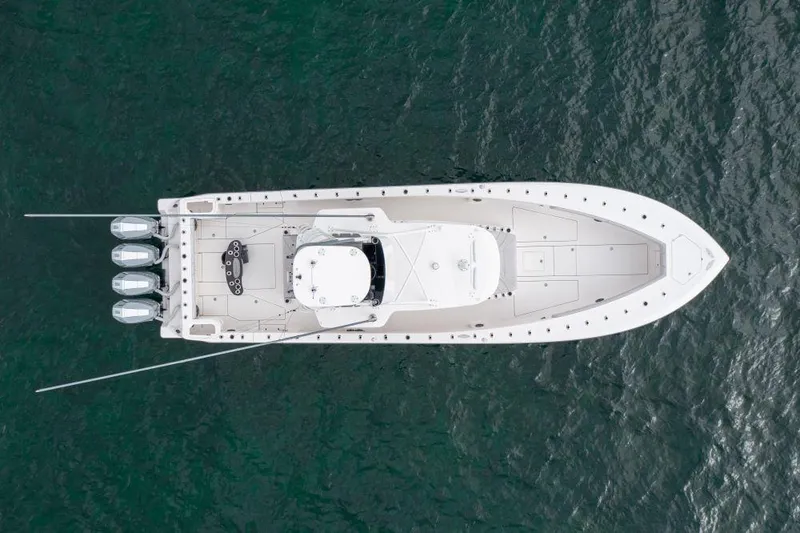  Yacht Photos Pics Aerial view of 2023 SeaVee 420Z boat on water, showcasing sleek design and multiple engines.