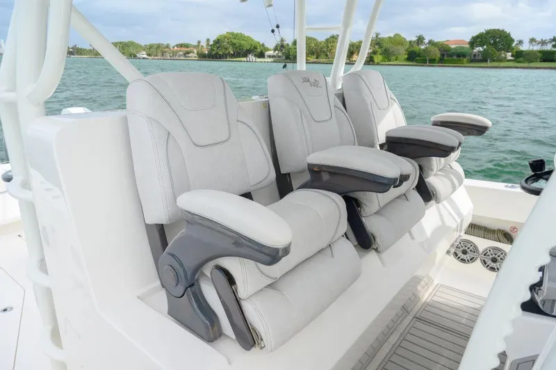  Yacht Photos Pics Luxury seating on 2023 SeaVee 420Z boat with scenic water backdrop.