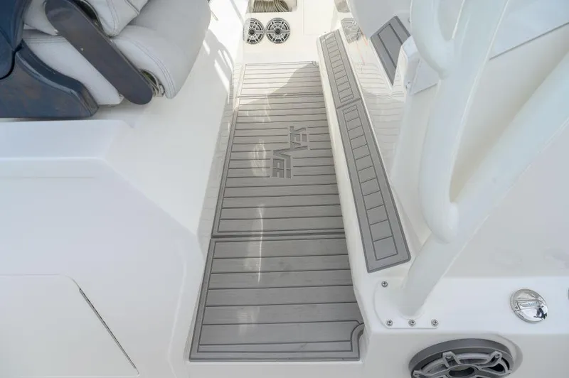  Yacht Photos Pics 2023 SeaVee 420Z boat deck with cushioned seating and non-slip flooring.