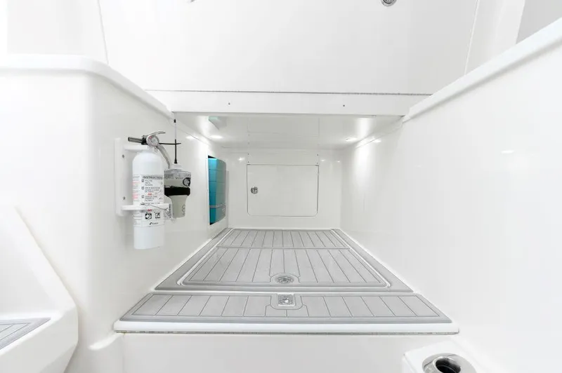 Yacht Photos Pics 2023 SeaVee 420Z interior with sleek white design and safety equipment.