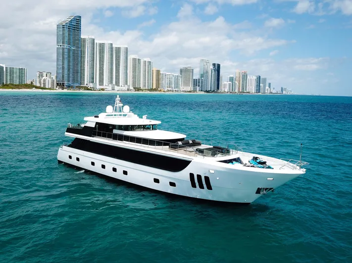  Yacht Photos Pics Luxury Custom WHS Marine yacht cruising near a city skyline, 2010 model.