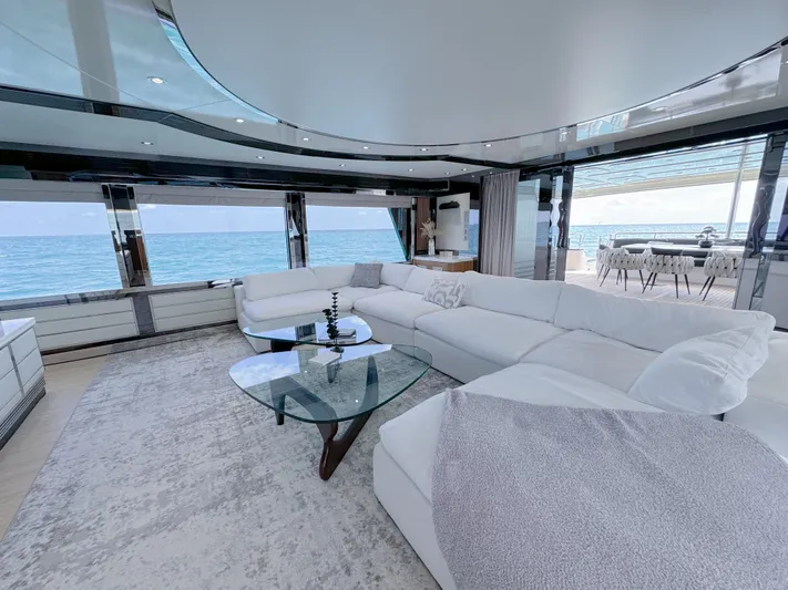  Yacht Photos Pics Luxurious 2010 WHS Marine yacht interior with white sectional sofa and ocean view.