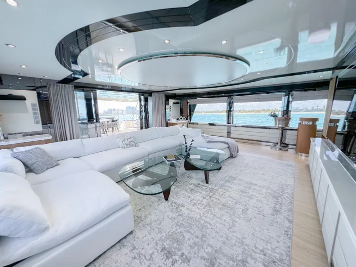  Yacht Photos Pics Luxurious 2010 Custom WHS Marine yacht interior with modern white sectional sofa and glass tables.