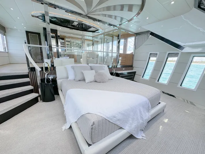  Yacht Photos Pics Luxurious bedroom interior of 2010 Custom WHS Marine yacht with ocean view windows.
