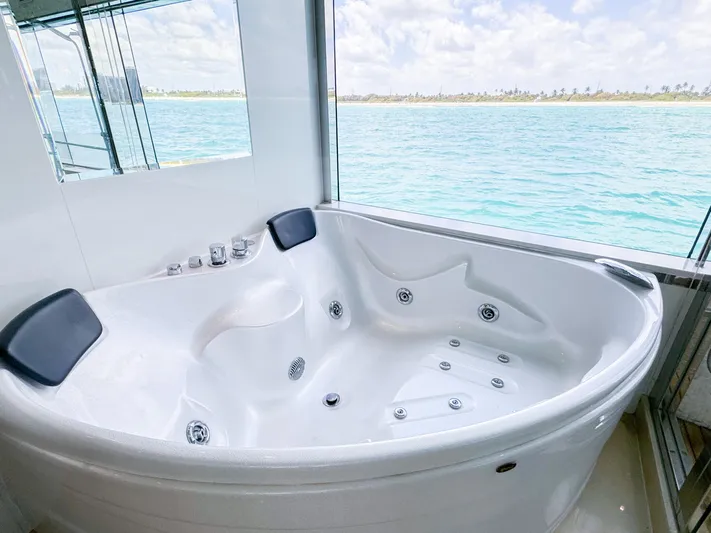  Yacht Photos Pics Luxurious hot tub on a 2010 Custom WHS Marine yacht with ocean view.