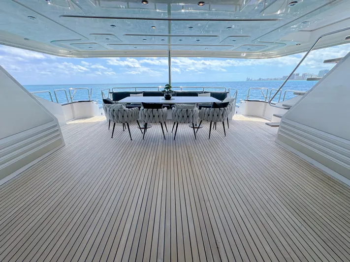  Yacht Photos Pics Luxurious 2010 Custom WHS Marine yacht deck with ocean view and elegant dining area.