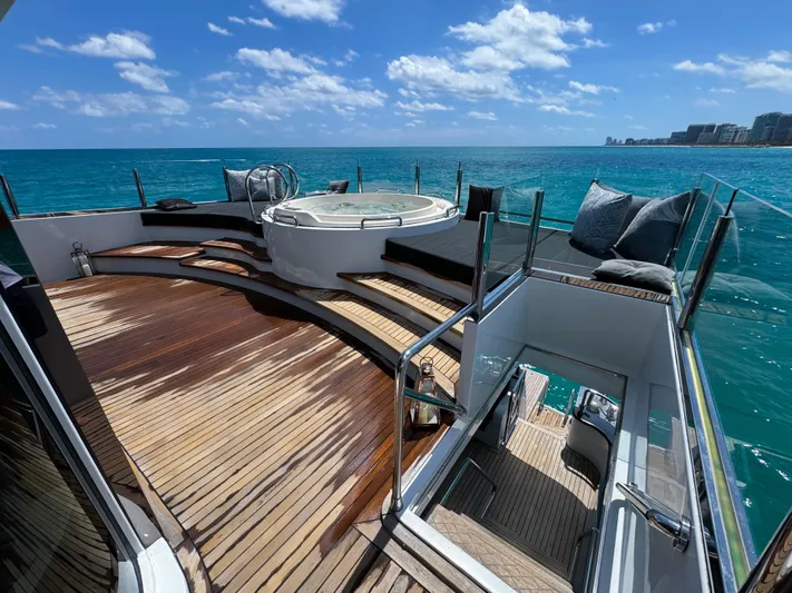  Yacht Photos Pics Luxurious 2010 Custom WHS Marine yacht deck with hot tub and ocean view.