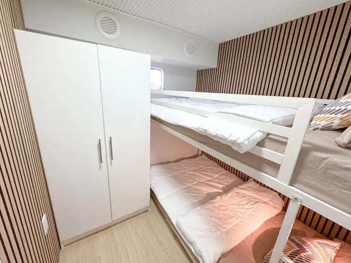  Yacht Photos Pics Compact marine cabin with bunk beds and wardrobe, WHS Marine 2010 model.