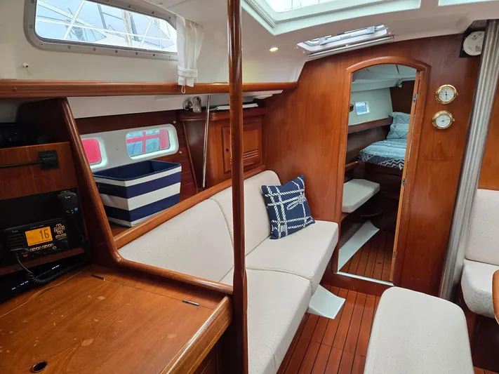 Salish Breeze Yacht Photos Pics Port-side Seating and Nav Station
